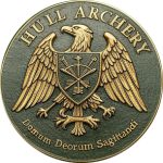 Golden Eagle Award badge with five arrows hitting the yellow target zone, symbolizing excellence and high achievement at Hull Archery Club.